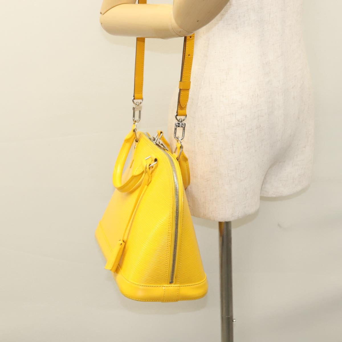 Louis Vuitton Alma, Yellow, Leather, handbag
