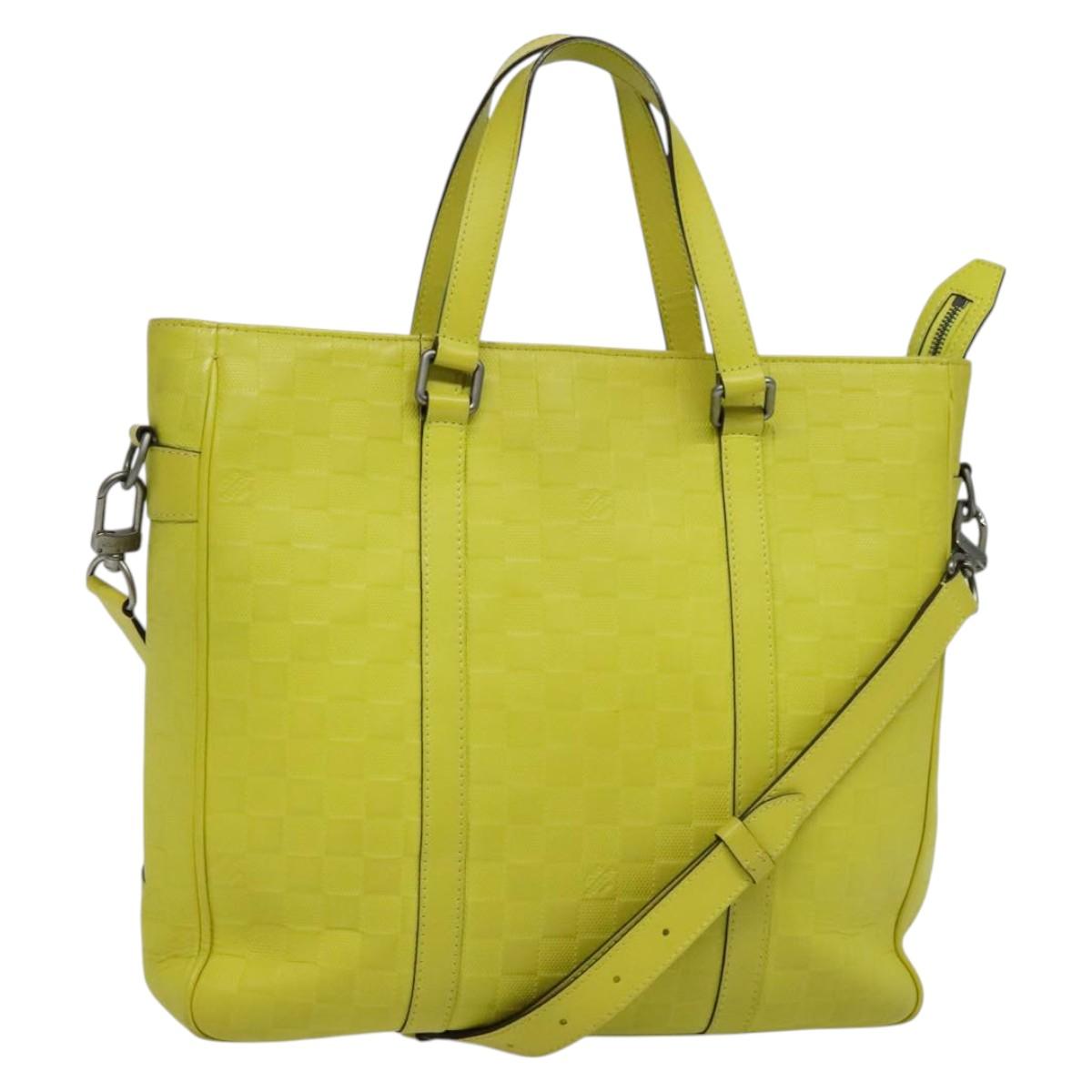 Louis Vuitton Tadao, Yellow, Leather, handbag