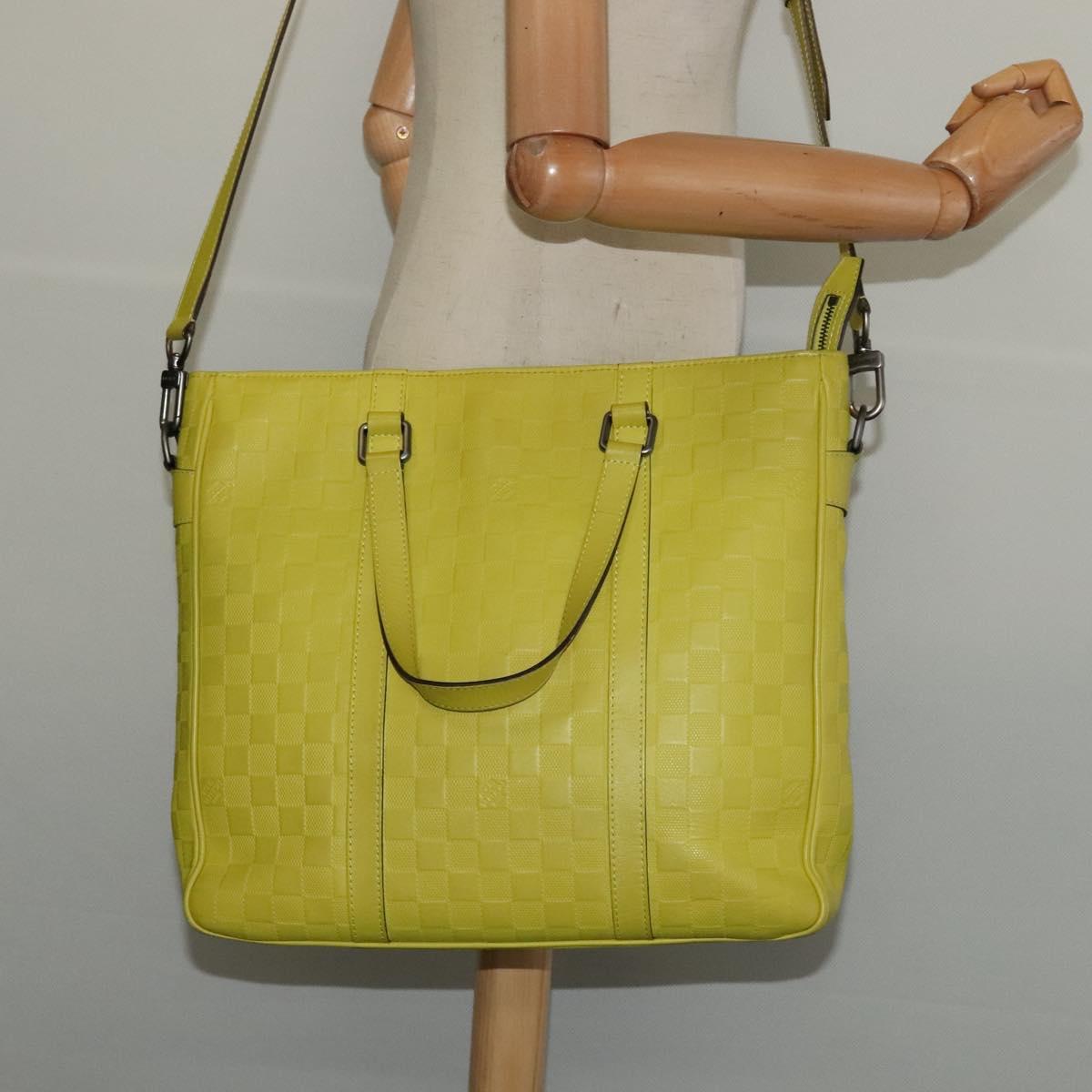 Louis Vuitton Tadao, Yellow, Leather, handbag