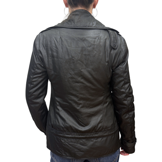 Brandsamsara black long sleeve CNC Costume National coat worn by a model, back view showing tailored fit.