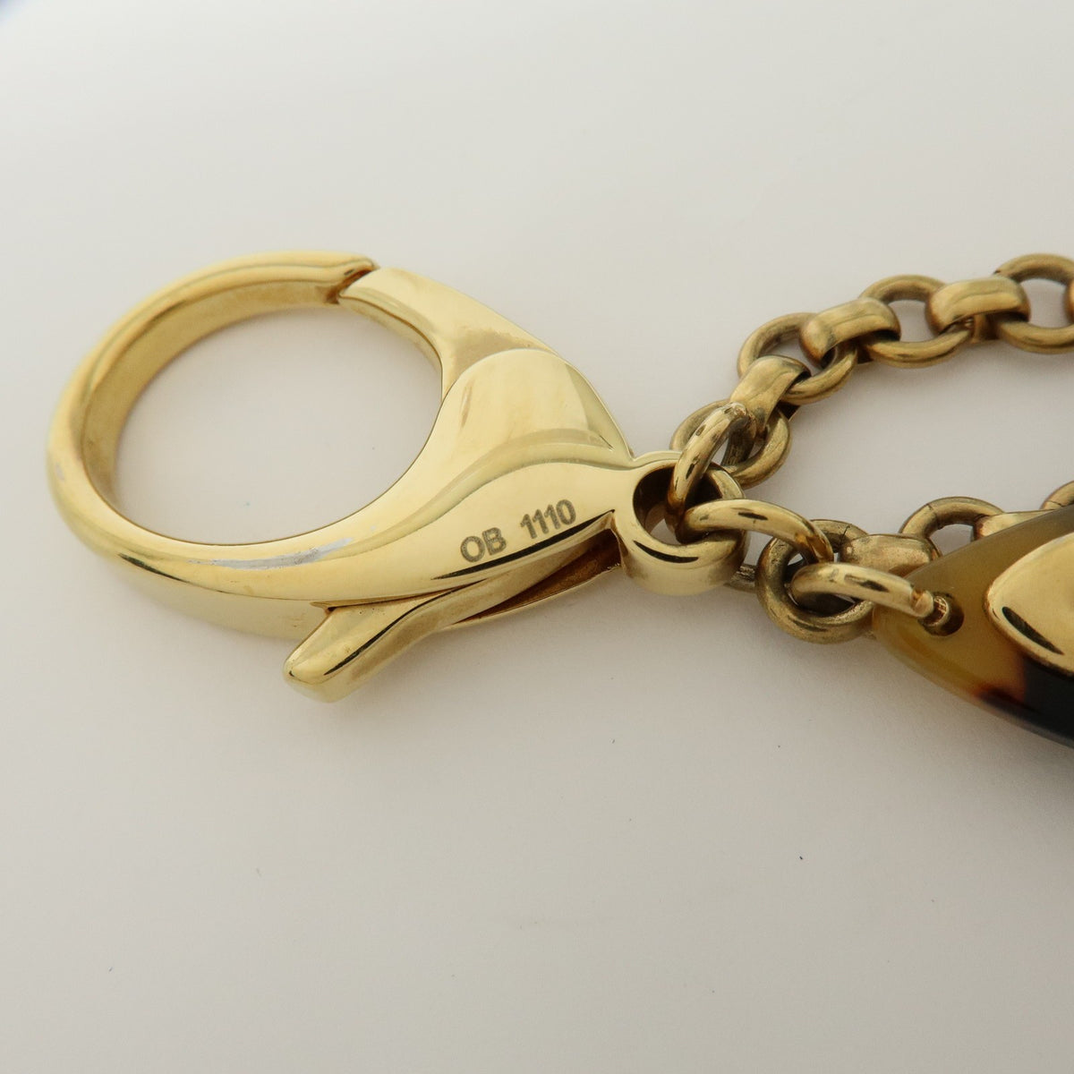 Louis Vuitton Insolence Bag Charm Metal and Tortoise, Gold, Metal, Charm