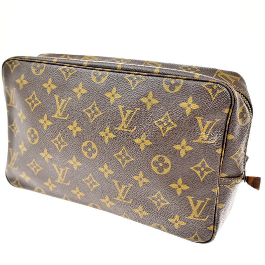 Louis Vuitton Trousse Toilette Monogram Canvas, BROWN, CANVAS, Clutche & pouche