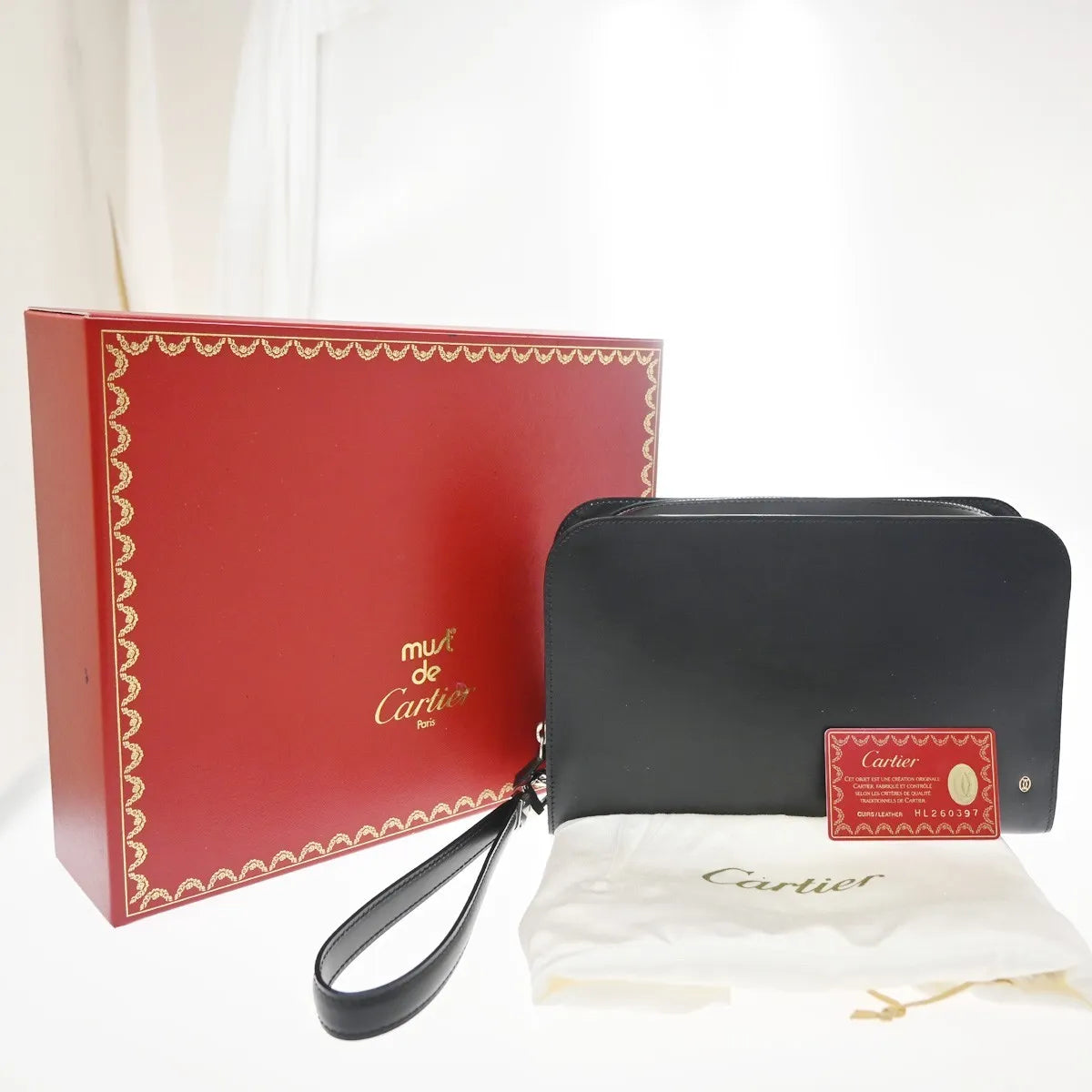 Cartier Pouch with a handle Box Calf, Black, Leather, Clutch