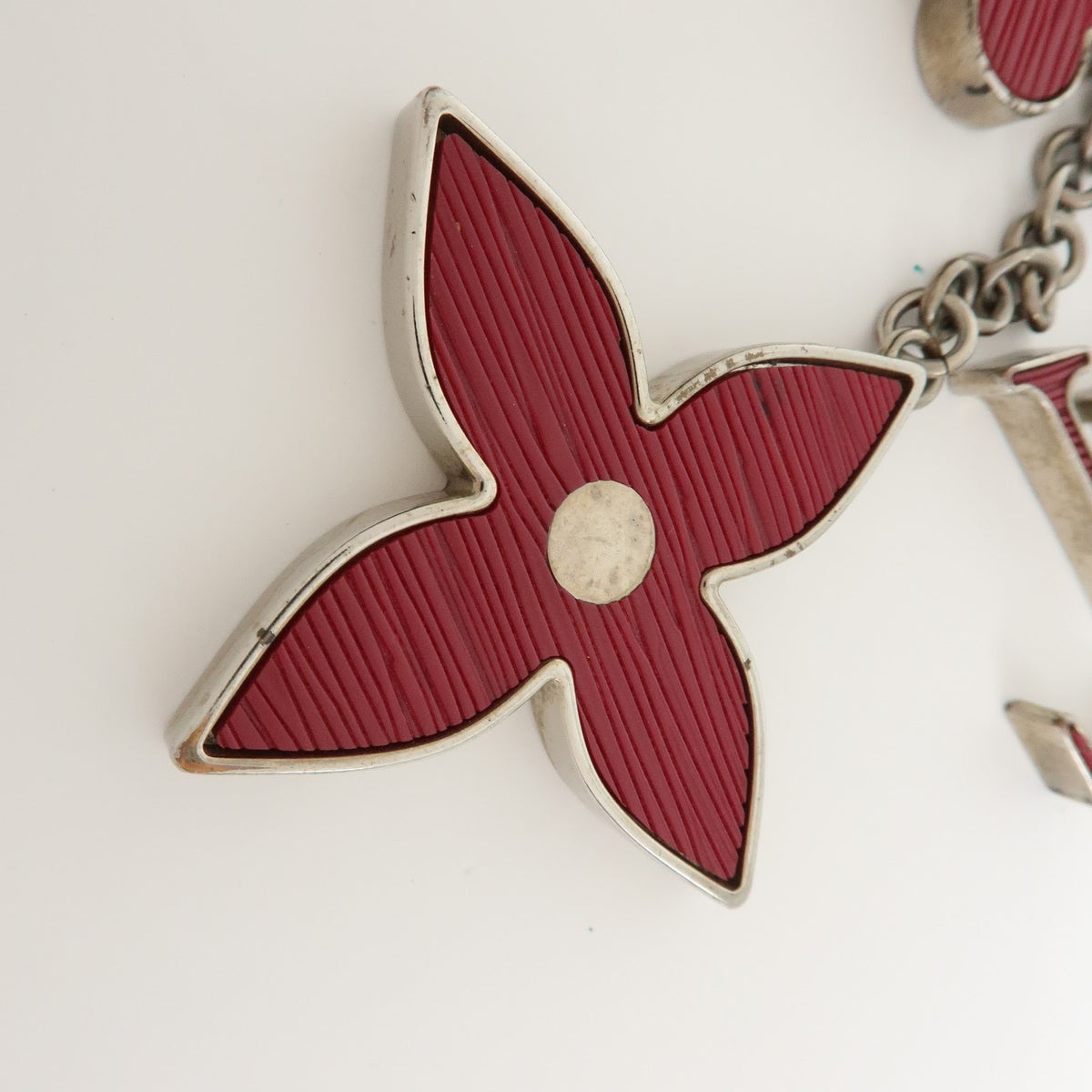 Louis Vuitton Fleur d'Epi Bag Charm Resin and Brass, Burgundy, Metal, Charm