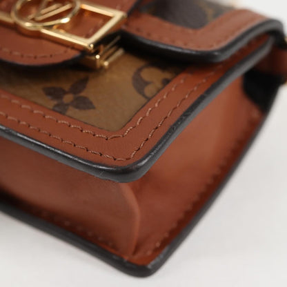 Louis Vuitton Dauphine Reverse Monogram Canvas, Brown, Canvas, Clutch