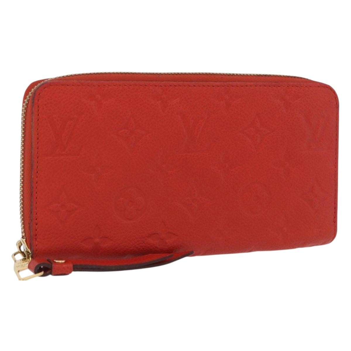 Louis Vuitton Portefeuille zippy Monogramme Empreinte Monogramme Empreinte, Orange, Leather, Wallet
