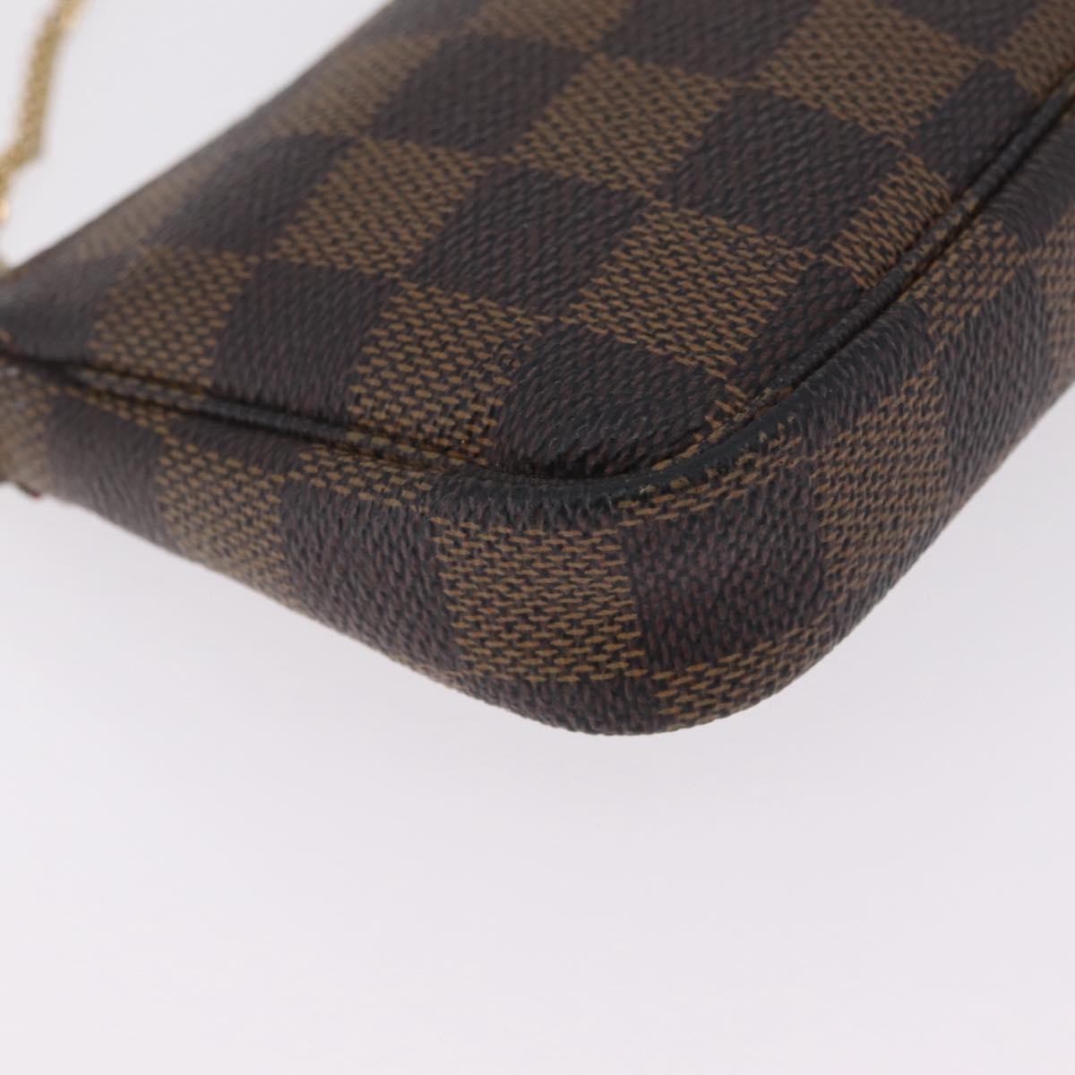 Louis Vuitton Mini pochette accessoires Damier Canvas, Brown, Canvas, Clutch