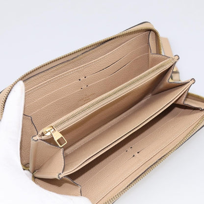 Louis Vuitton Zippy Monogram Empreinte Leather, Beige, Leather, Wallet