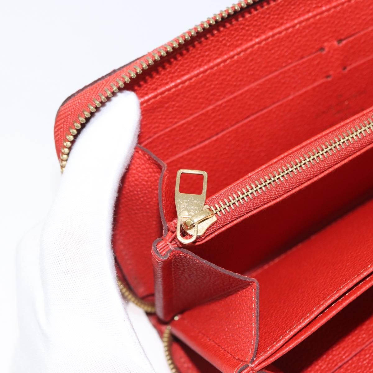 Louis Vuitton Portefeuille zippy Monogramme Empreinte Monogramme Empreinte, Orange, Leather, Wallet