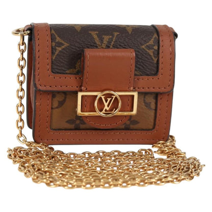 Louis Vuitton Dauphine Reverse Monogram Canvas, Brown, Canvas, Clutch