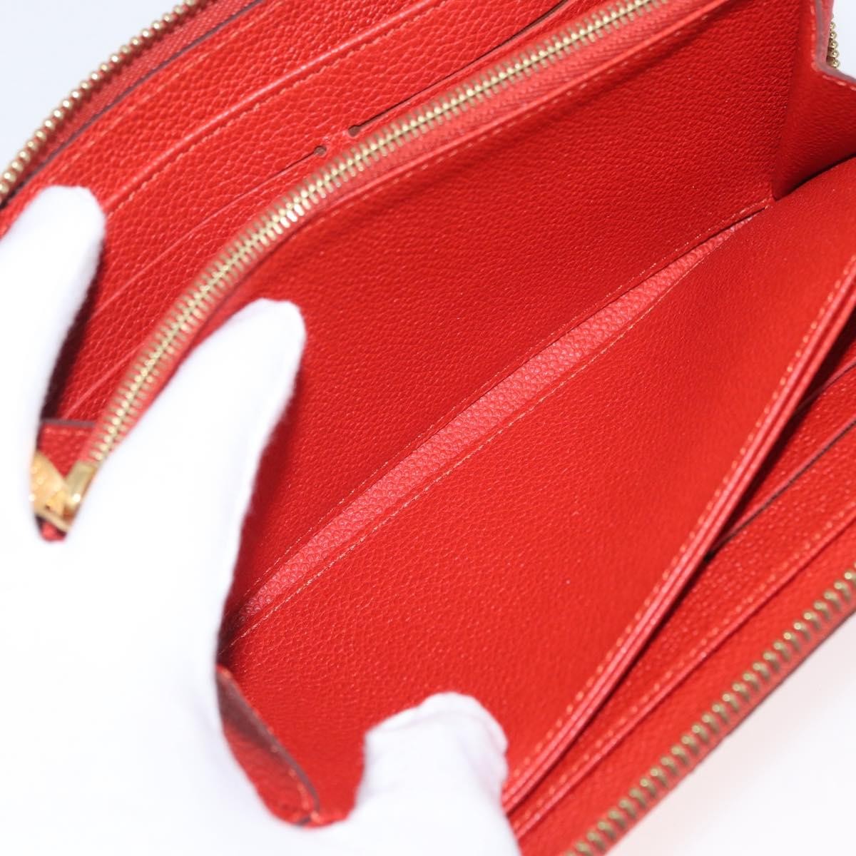 Louis Vuitton Portefeuille zippy Monogramme Empreinte Monogramme Empreinte, Orange, Leather, Wallet