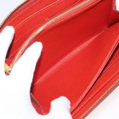 Louis Vuitton Portefeuille zippy Monogramme Empreinte Monogramme Empreinte, Orange, Leather, Wallet