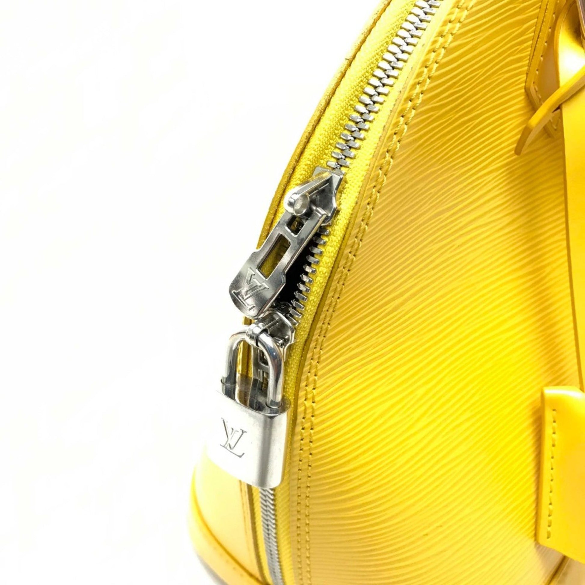 Louis Vuitton Alma, Yellow, Leather, handbag