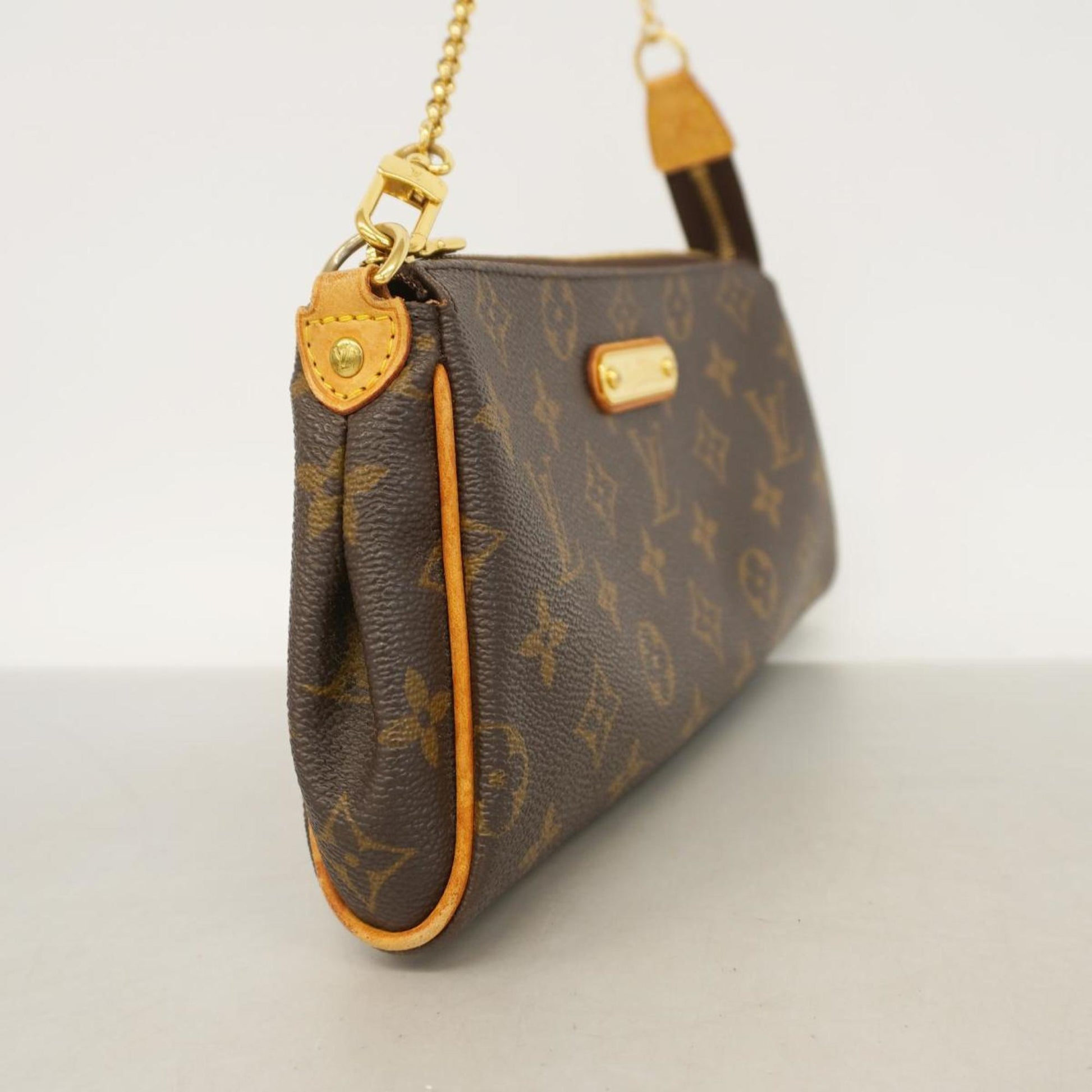 Louis Vuitton Eva, Brown, Canvas, clutch