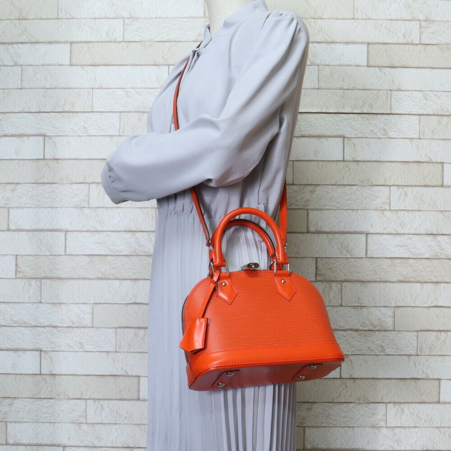 Louis Vuitton Alma BB, Orange, Leather, handbag