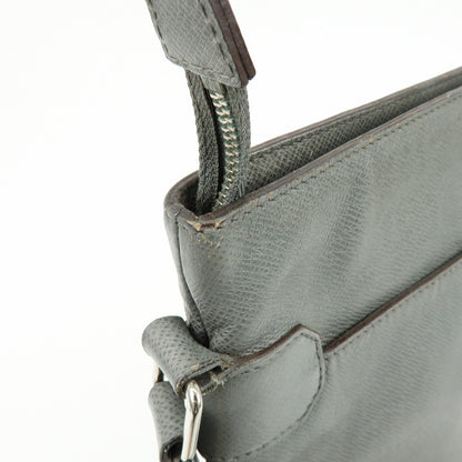 Louis Vuitton Sasha Taiga Leather, Gray, Leather, Handbag