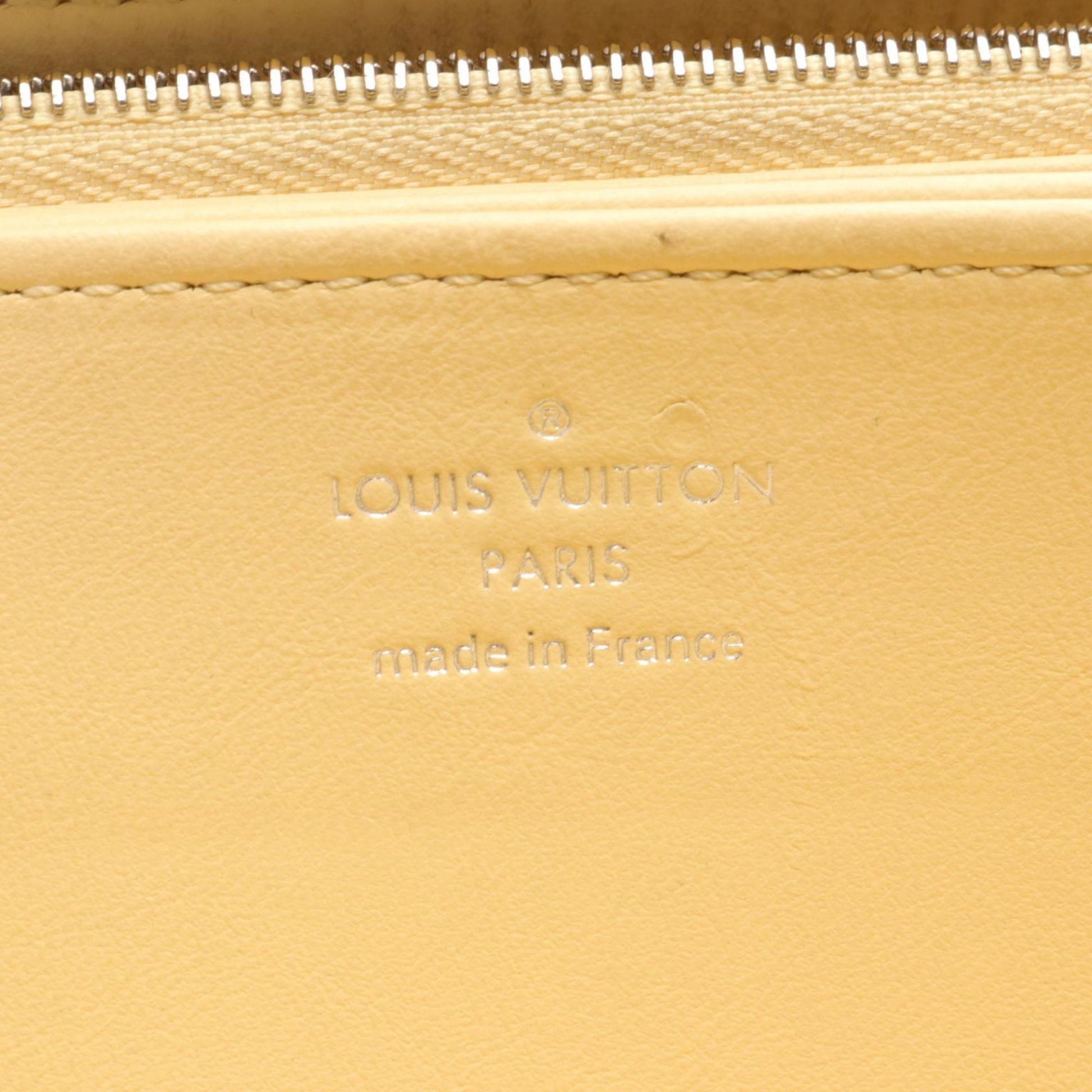 Louis Vuitton Portefeuille zippy, Yellow, Leather, wallet