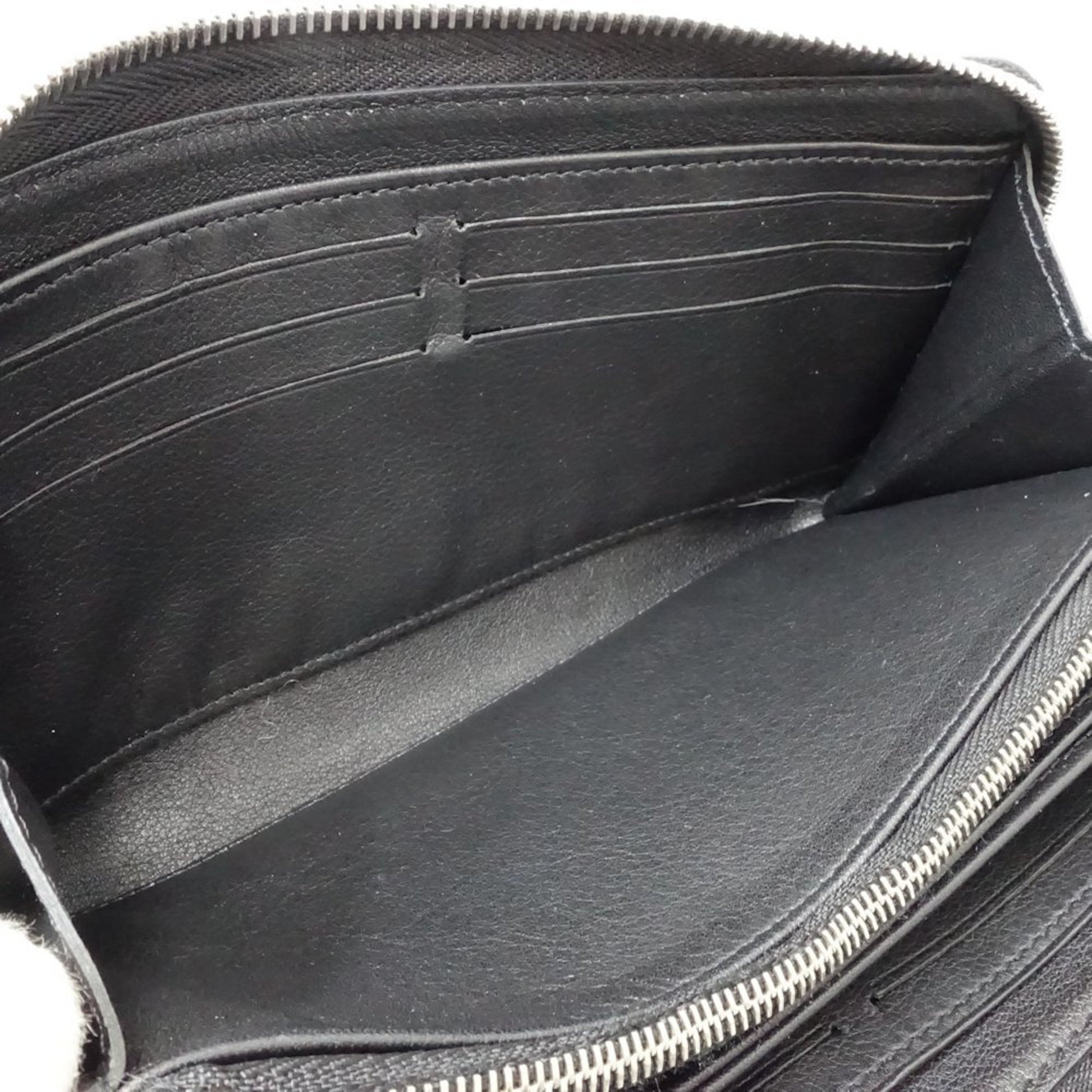 Louis Vuitton Portefeuille zippy, Black, Leather, wallet