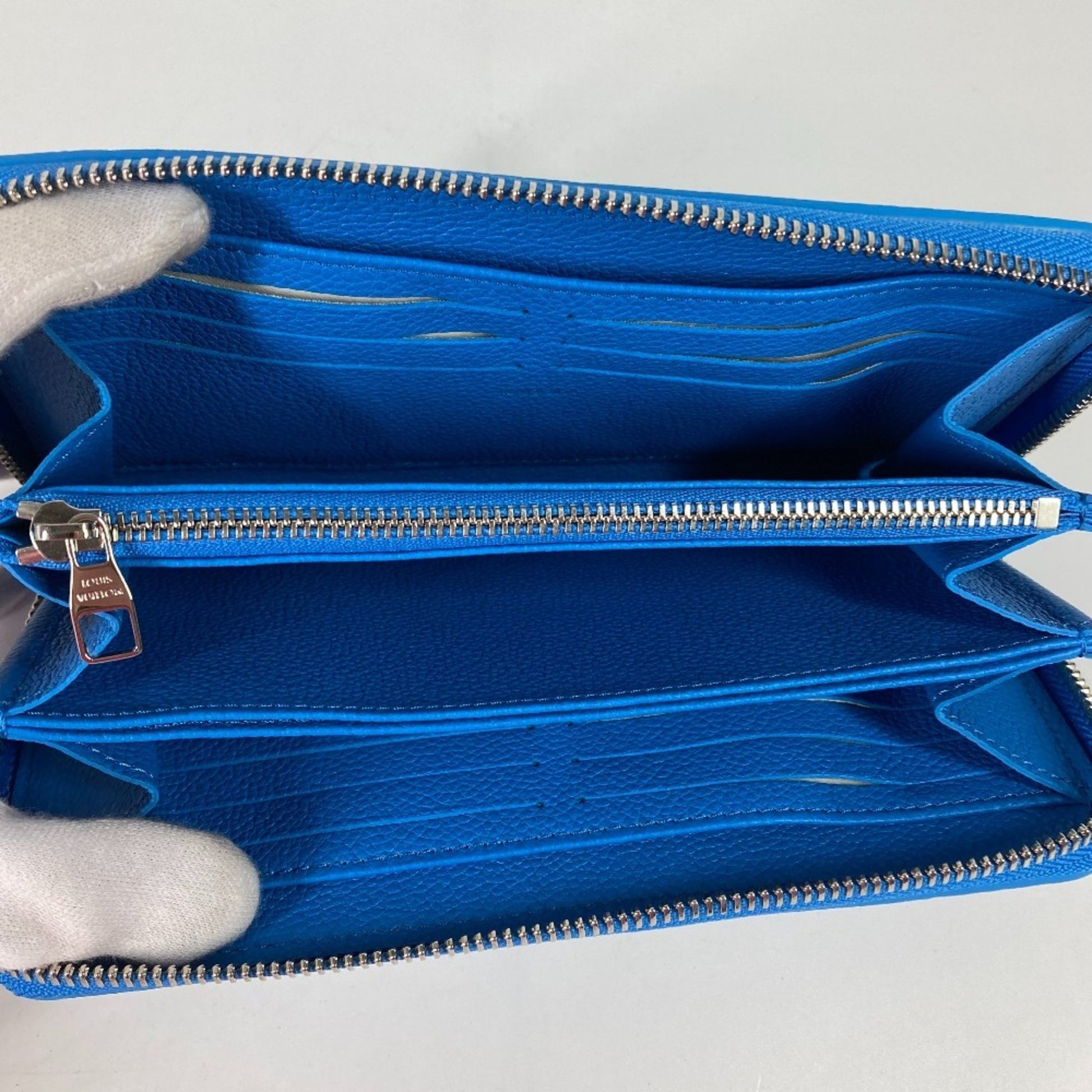Louis Vuitton Portefeuille zippy, Blue, Leather, wallet