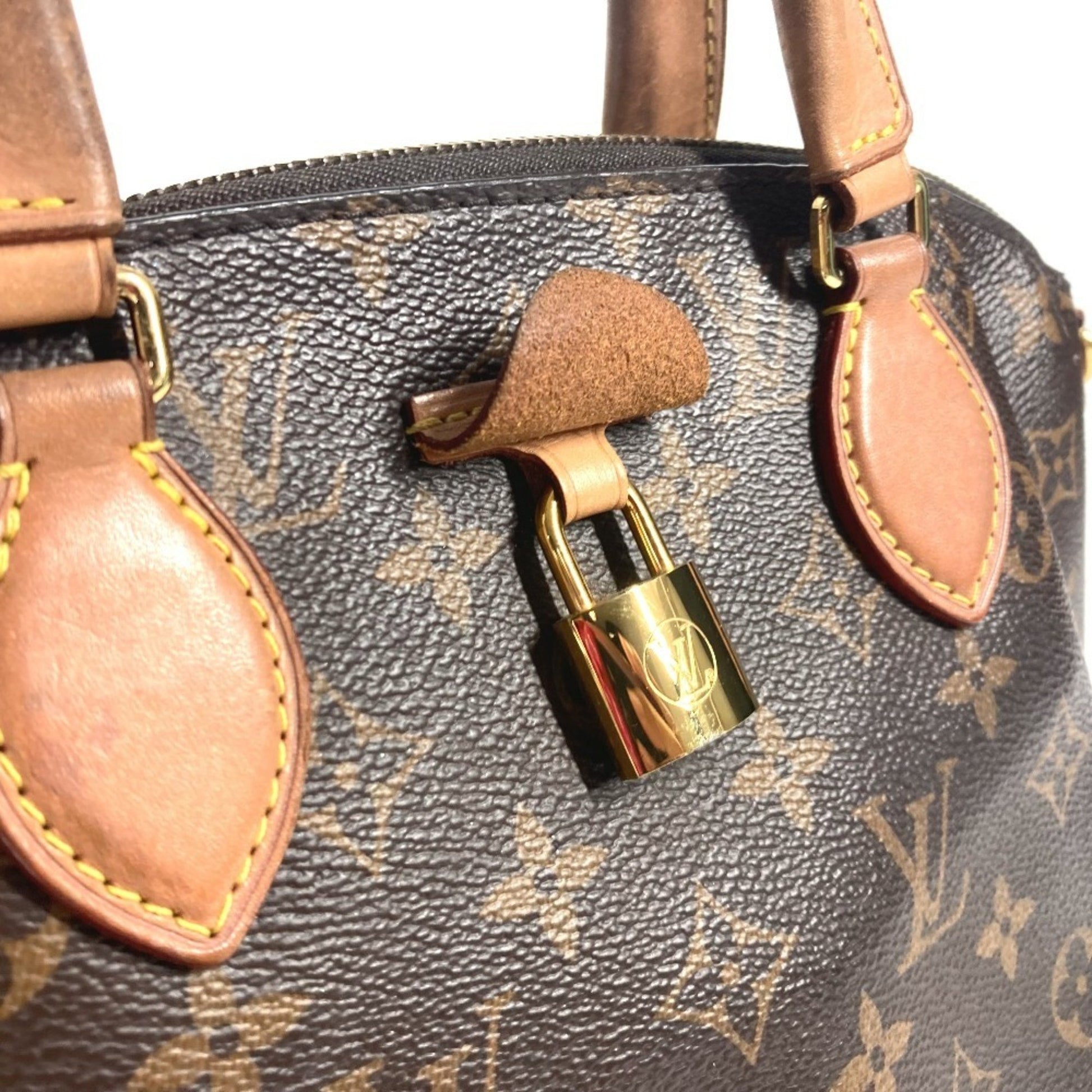 Louis Vuitton Rivoli, Brown, Canvas, tote