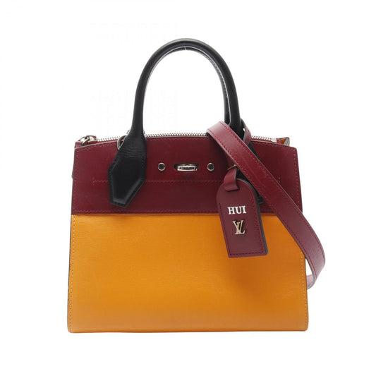Louis Vuitton City steamer, Yellow, Leather, handbag