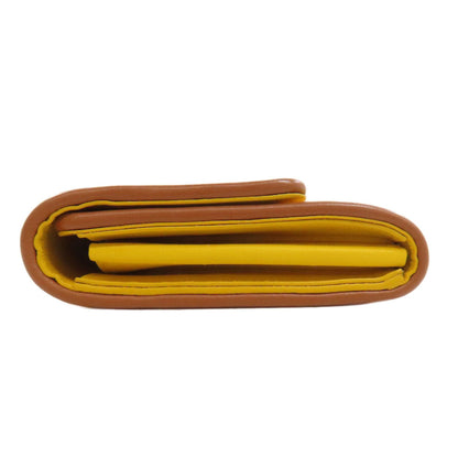 Louis Vuitton Capucines, Yellow, Canvas, wallet