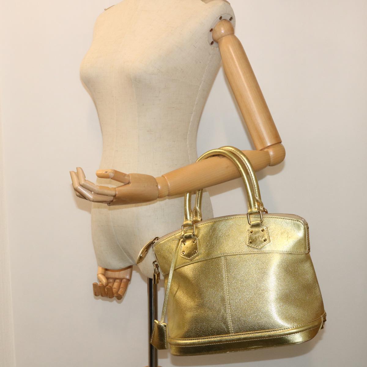 Louis Vuitton Lockit, Gold, Leather, handbag