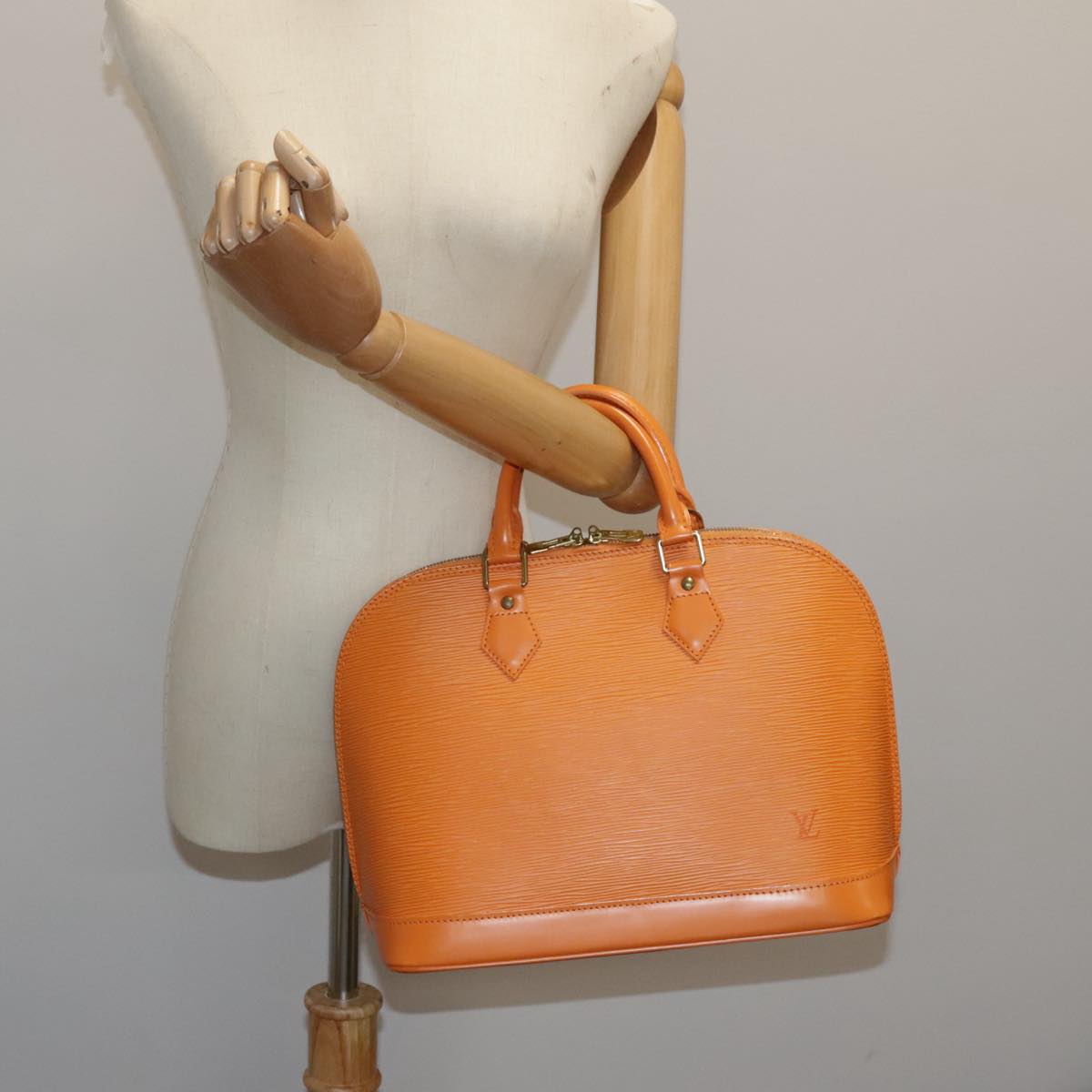 Louis Vuitton Alma, Orange, Leather, handbag