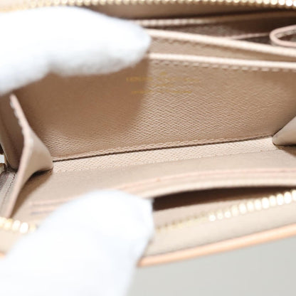 Louis Vuitton Zippy coin purse, Gold, Canvas, wallet