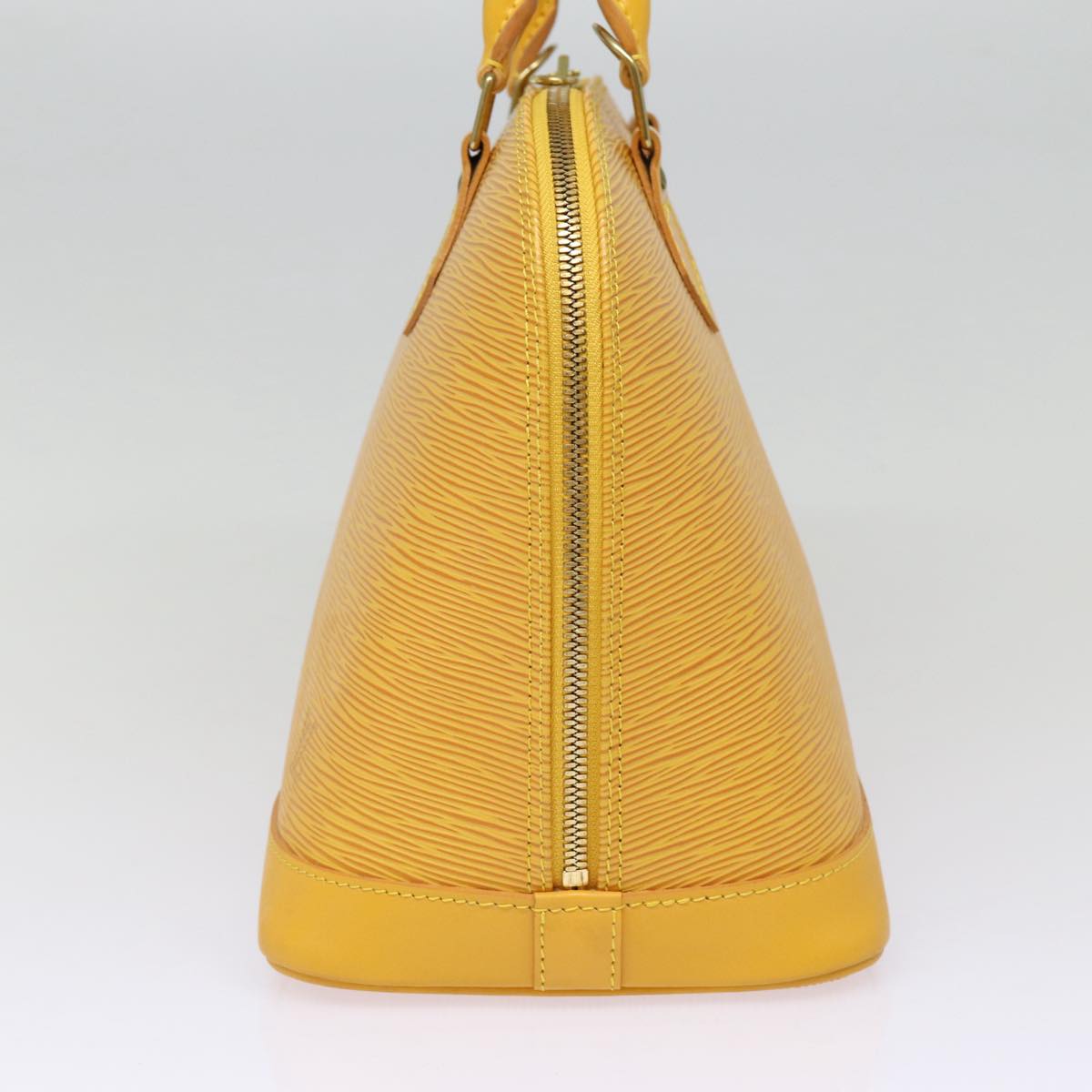 Louis Vuitton Alma, Yellow, Leather, handbag