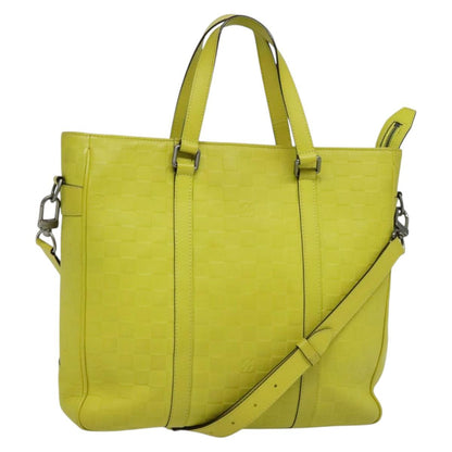 Louis Vuitton Tadao, Yellow, Leather, handbag