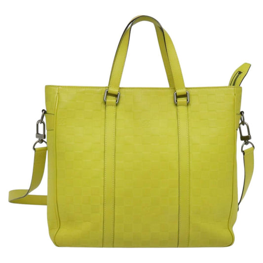 Louis Vuitton Tadao, Yellow, Leather, handbag