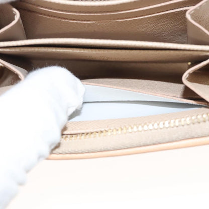 Louis Vuitton Zippy coin purse, Gold, Canvas, wallet