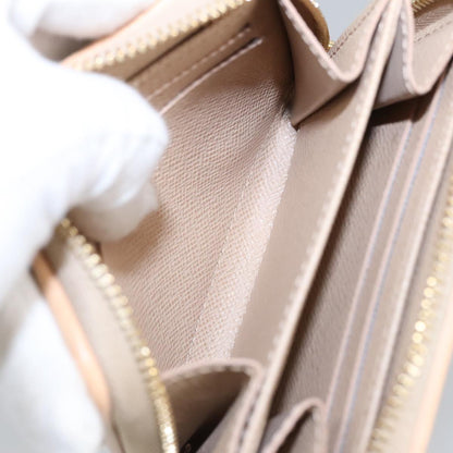 Louis Vuitton Zippy coin purse, Gold, Canvas, wallet