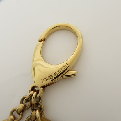 Louis Vuitton Insolence Bag Charm Metal and Tortoise, Gold, Metal, Charm