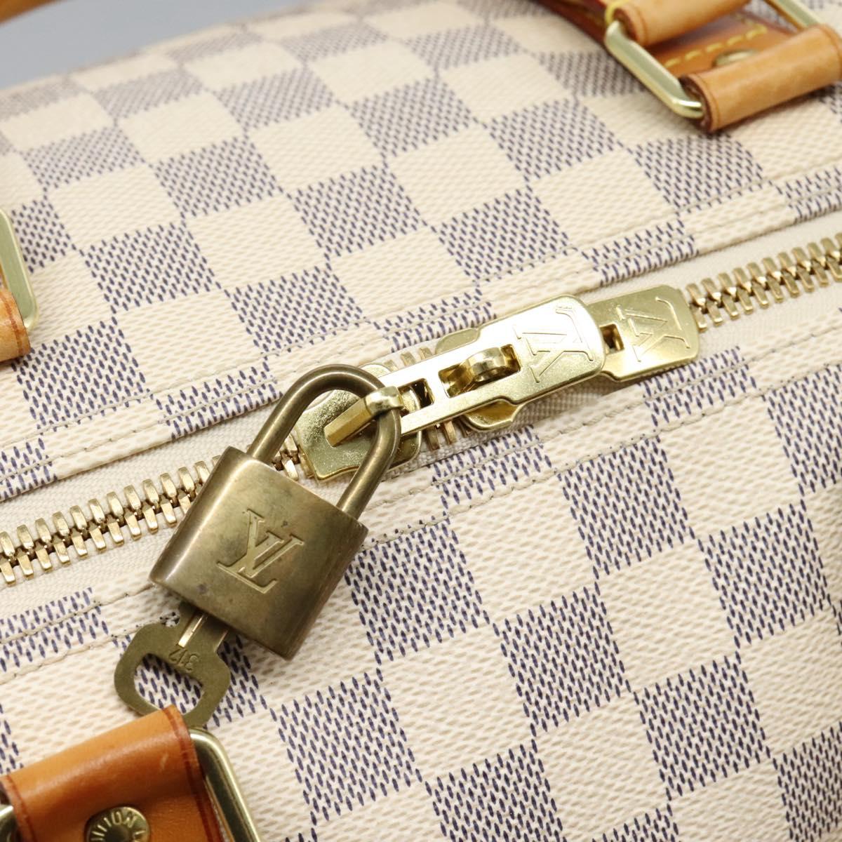 Louis Vuitton Keepall Bandoulière 55, White, Canvas, travel