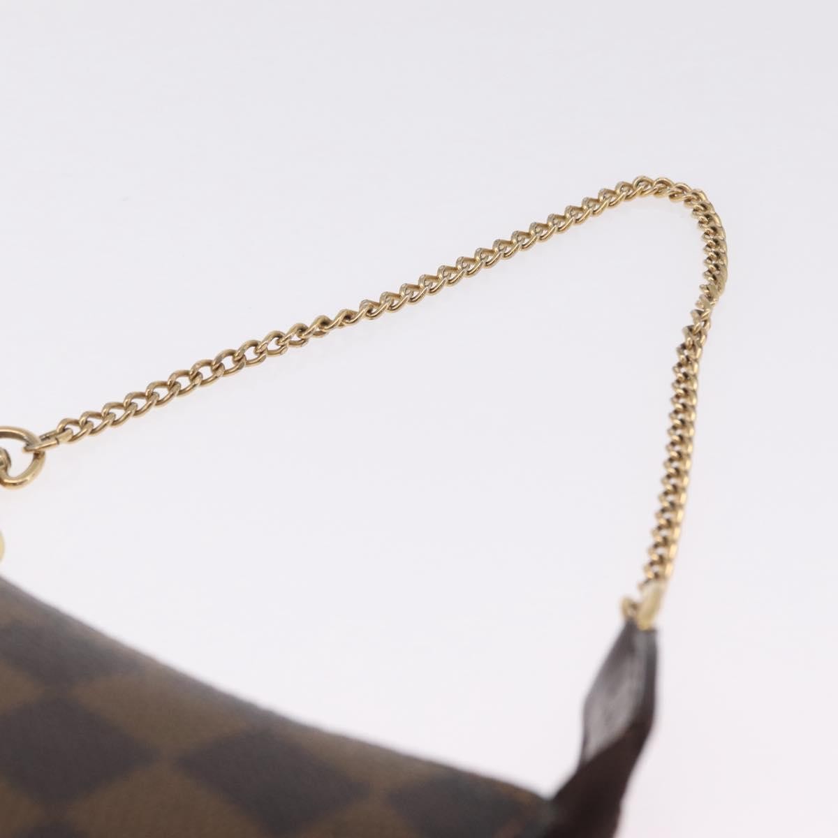 Louis Vuitton Mini pochette accessoires Damier Canvas, Brown, Canvas, Clutch