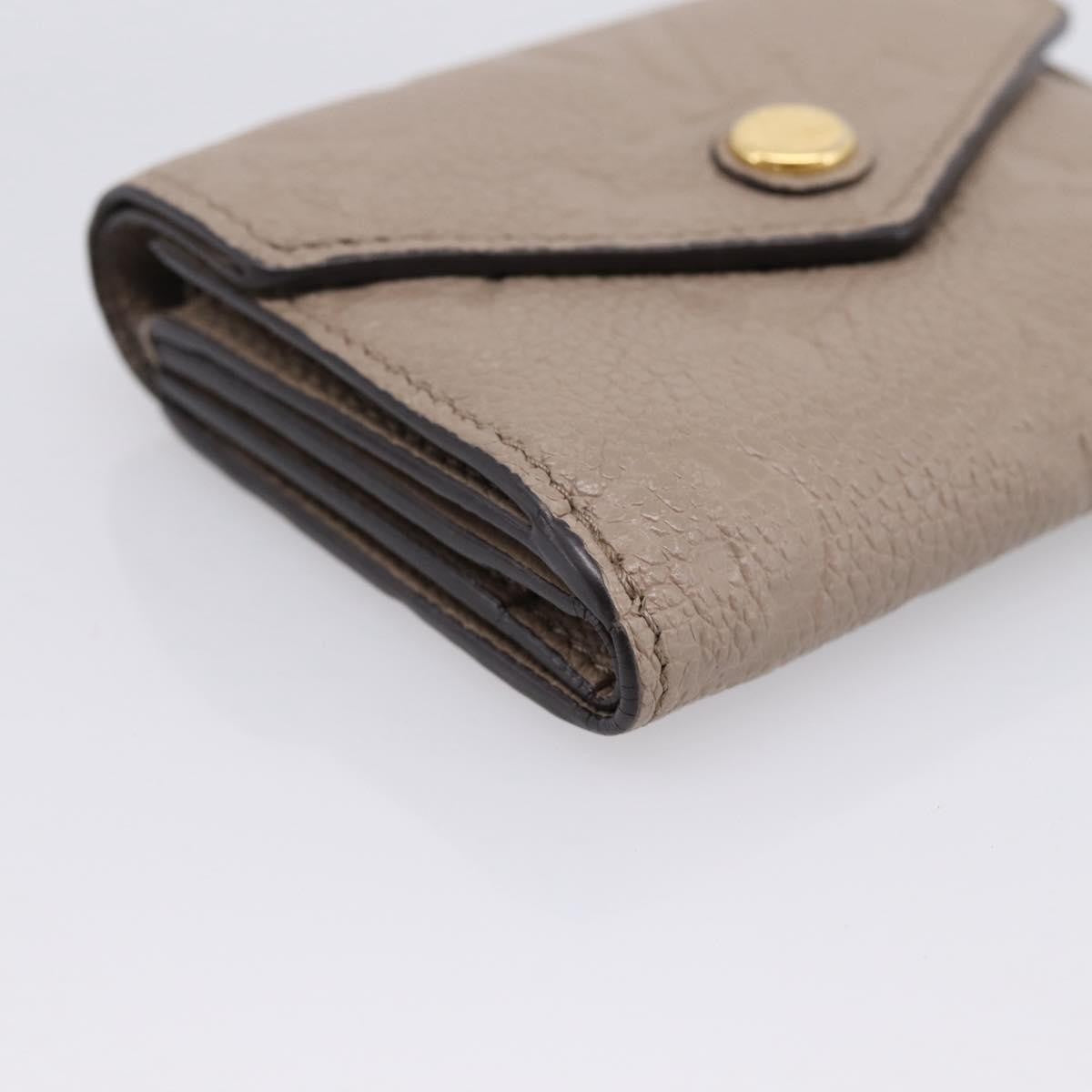 Louis Vuitton Zoe Monogram Empreinte Leather, Beige, Leather, Wallet