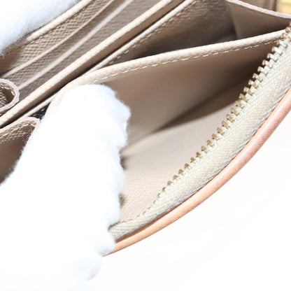 Louis Vuitton Zippy coin purse, Beige, Canvas, wallet