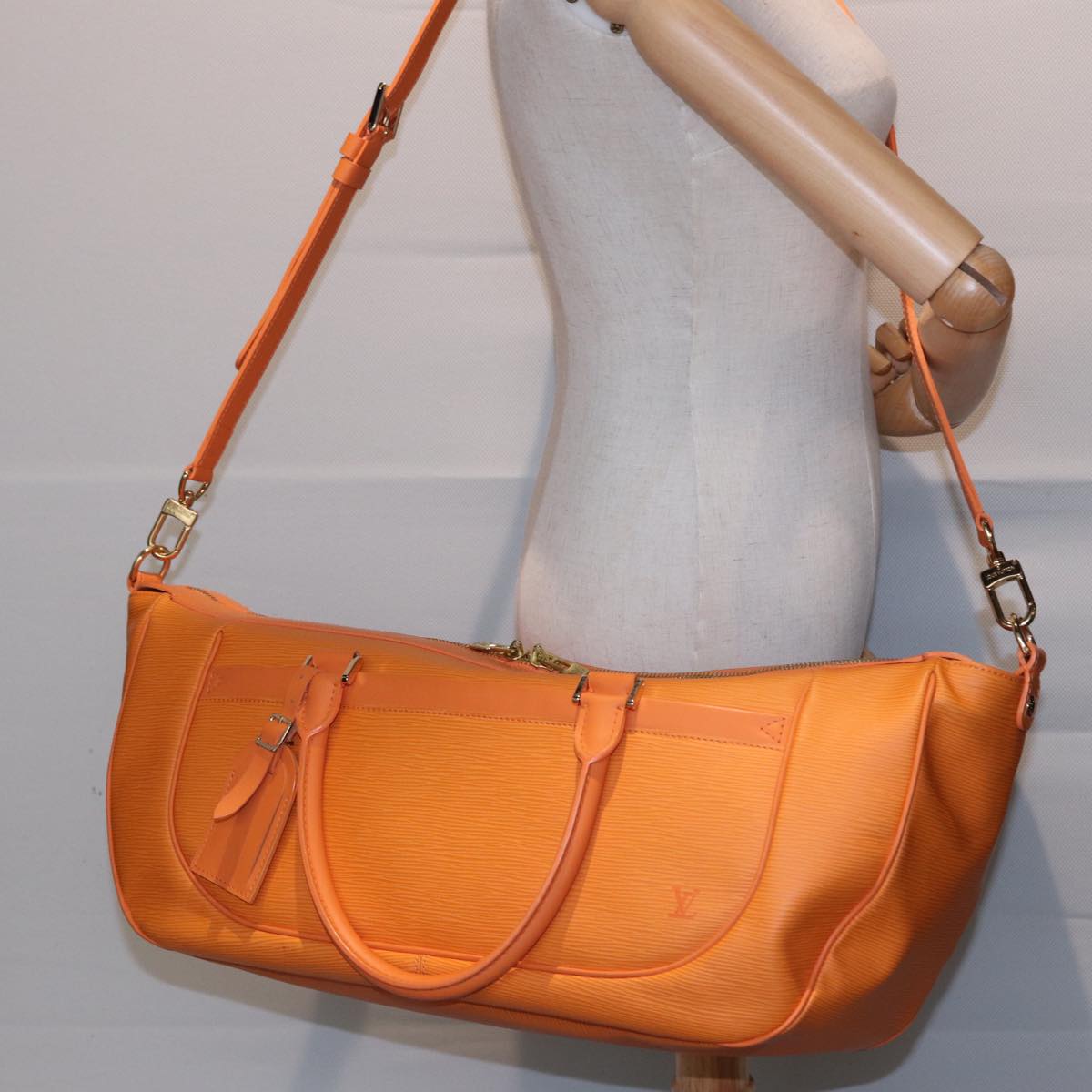 Louis Vuitton Danura, Orange, Leather, handbag