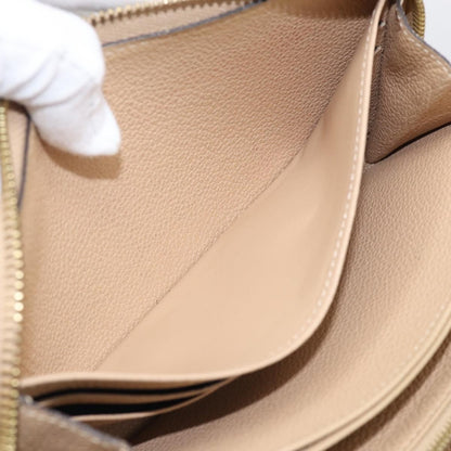 Louis Vuitton Zippy Monogram Empreinte Leather, Beige, Leather, Wallet