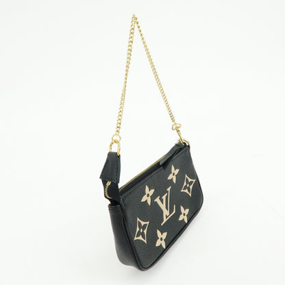 Louis Vuitton Pochette Accessoires Bicolor Monogram Empreinte Giant, Black, Leather, Clutch