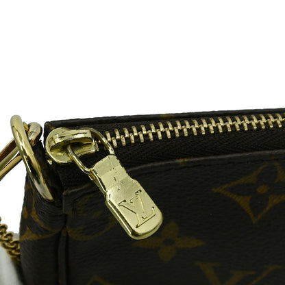 Louis Vuitton Mini pochette accessoires Canvas, Brown, Canvas, Clutch