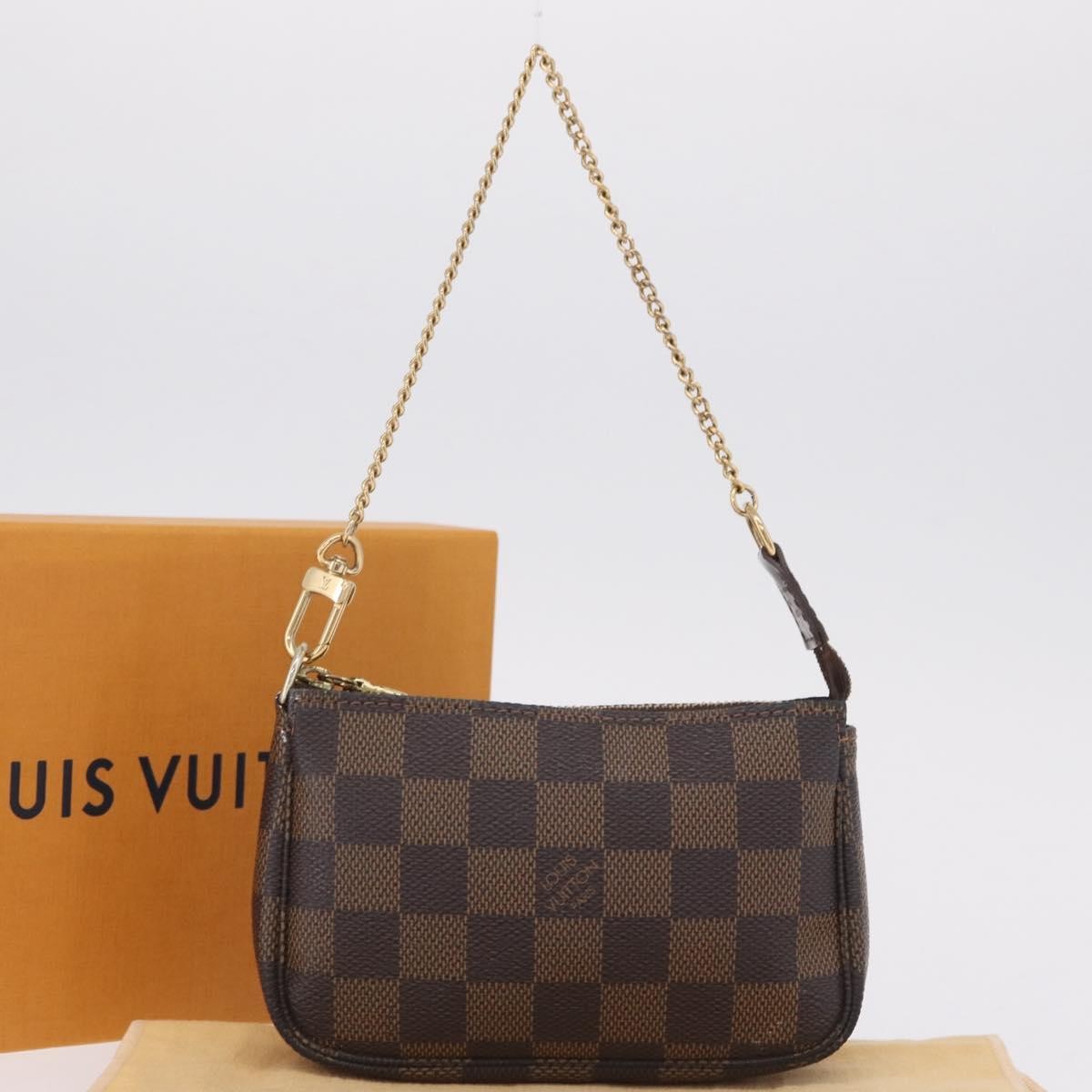 Louis Vuitton Mini pochette accessoires Damier Canvas, Brown, Canvas, Clutch