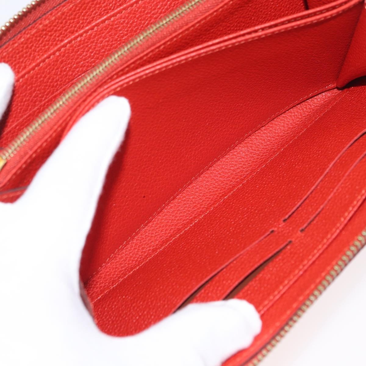 Louis Vuitton Portefeuille zippy Monogramme Empreinte Monogramme Empreinte, Orange, Leather, Wallet