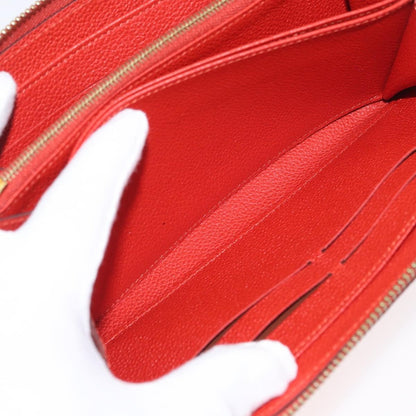 Louis Vuitton Portefeuille zippy Monogramme Empreinte Monogramme Empreinte, Orange, Leather, Wallet