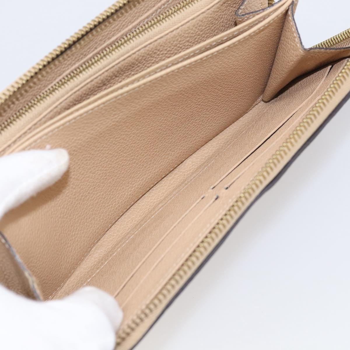 Louis Vuitton Zippy Monogram Empreinte Leather, Beige, Leather, Wallet