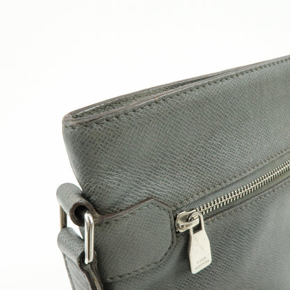 Louis Vuitton Sasha Taiga Leather, Gray, Leather, Handbag