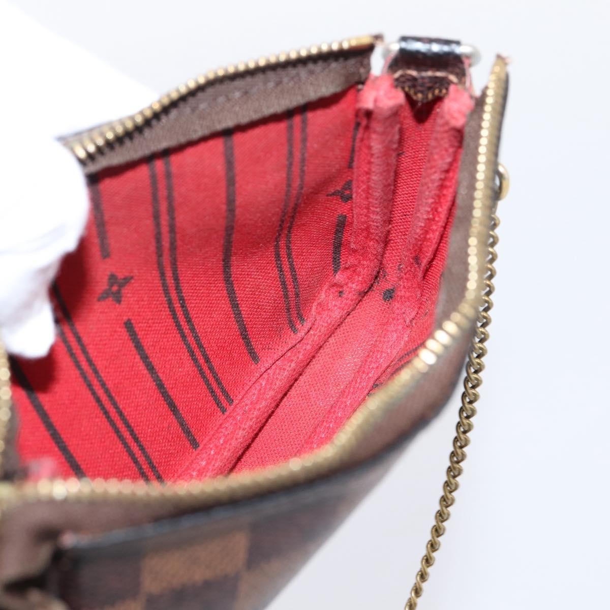 Louis Vuitton Mini pochette accessoires Damier Canvas, Brown, Canvas, Clutch