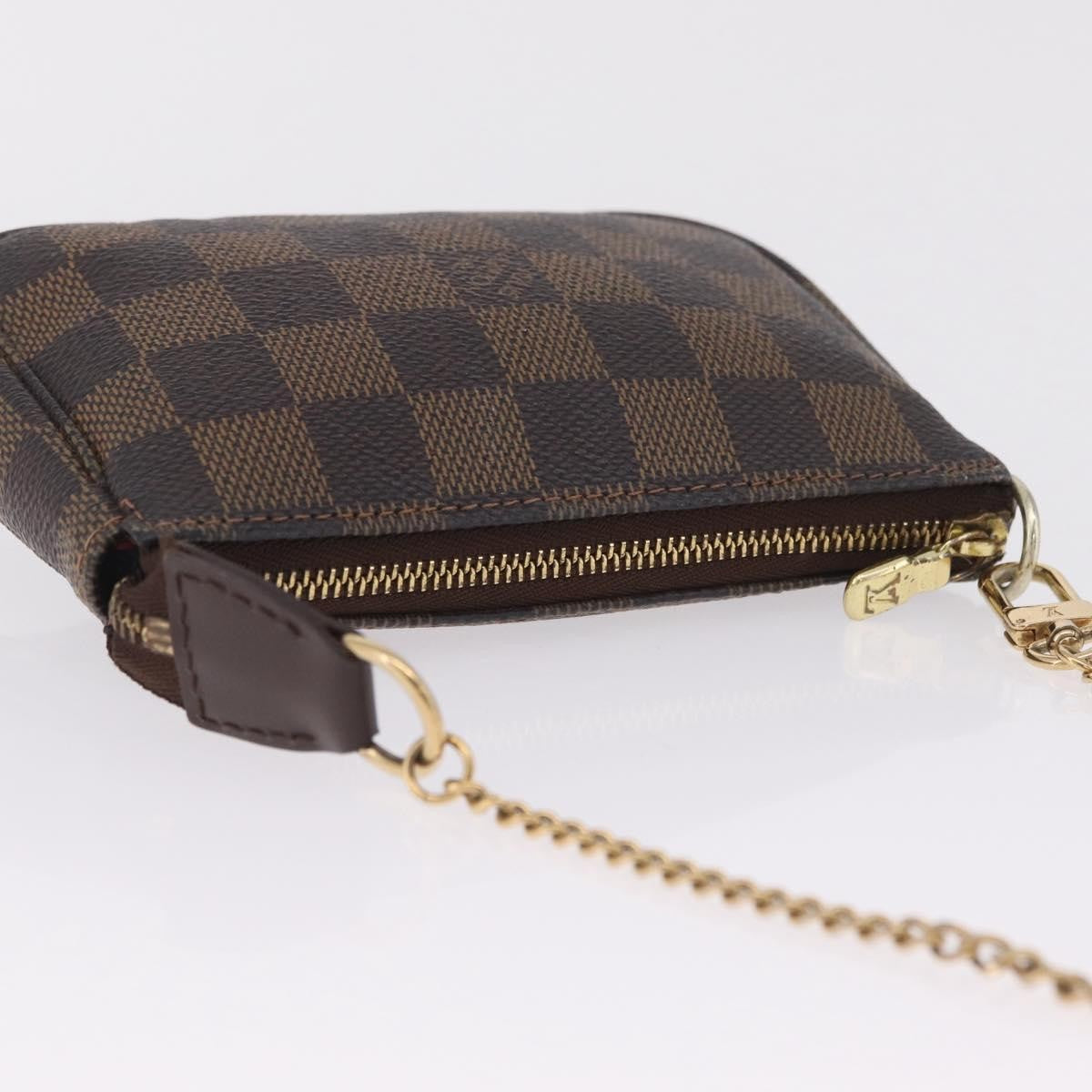 Louis Vuitton Mini pochette accessoires Damier Canvas, Brown, Canvas, Clutch